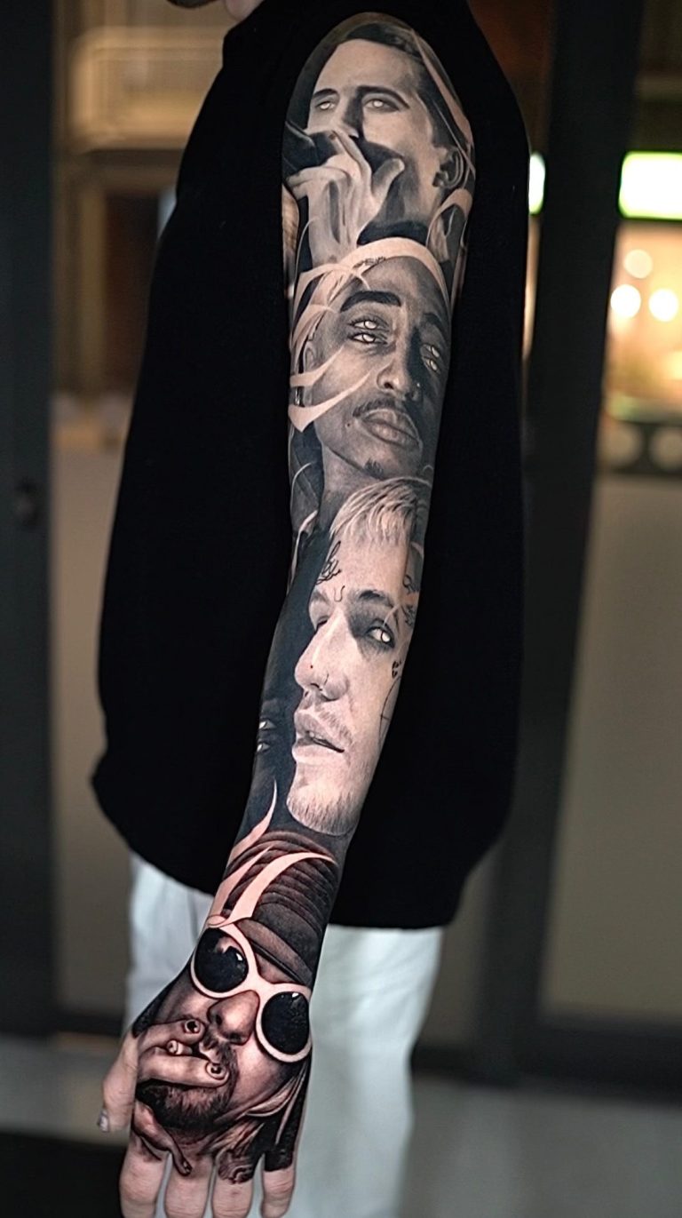 Tatuaje realista black and grey de Tupac, Canserbero, Lil Peep y Kurt Cobain en brazo completo